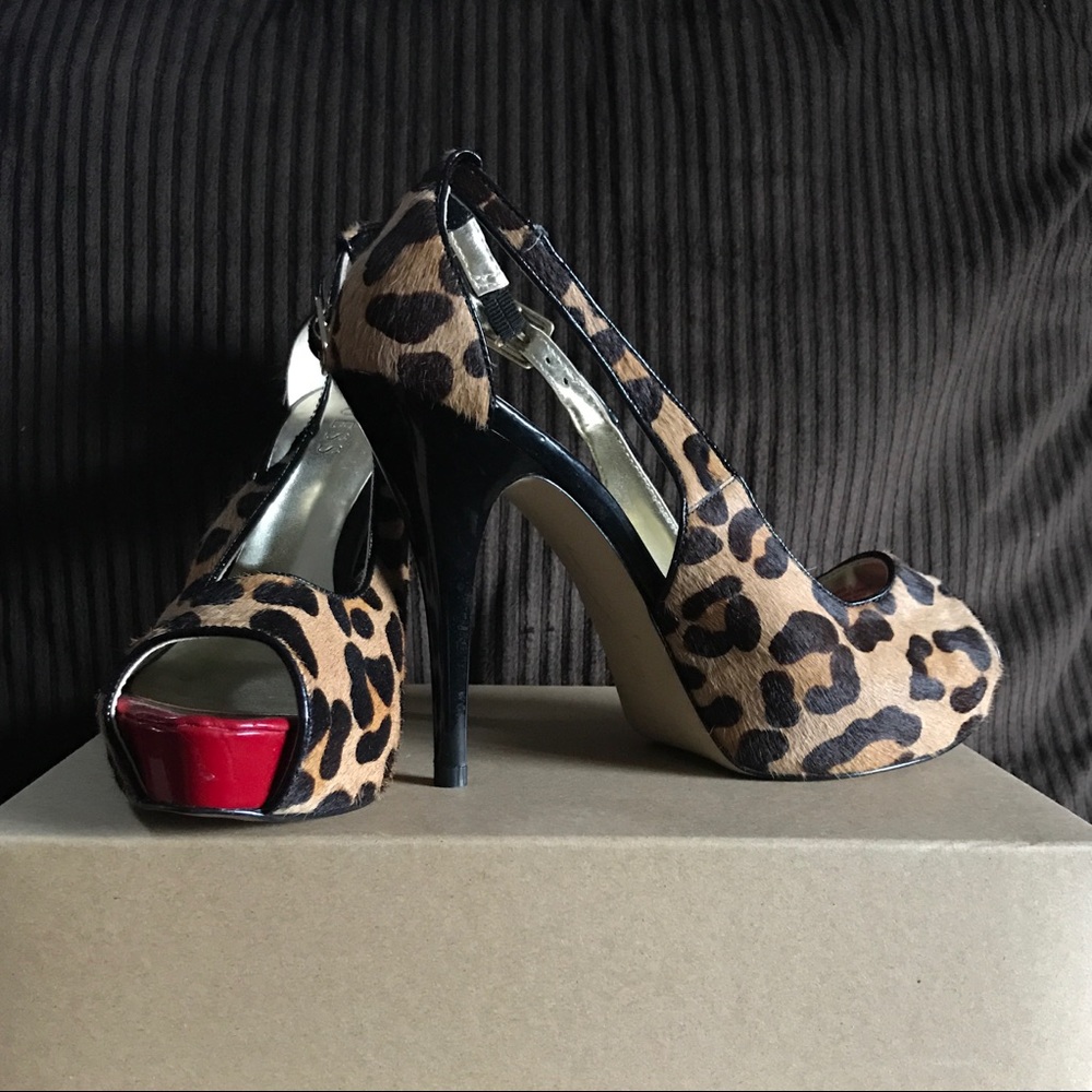 GUESS Faux cheetah platforms