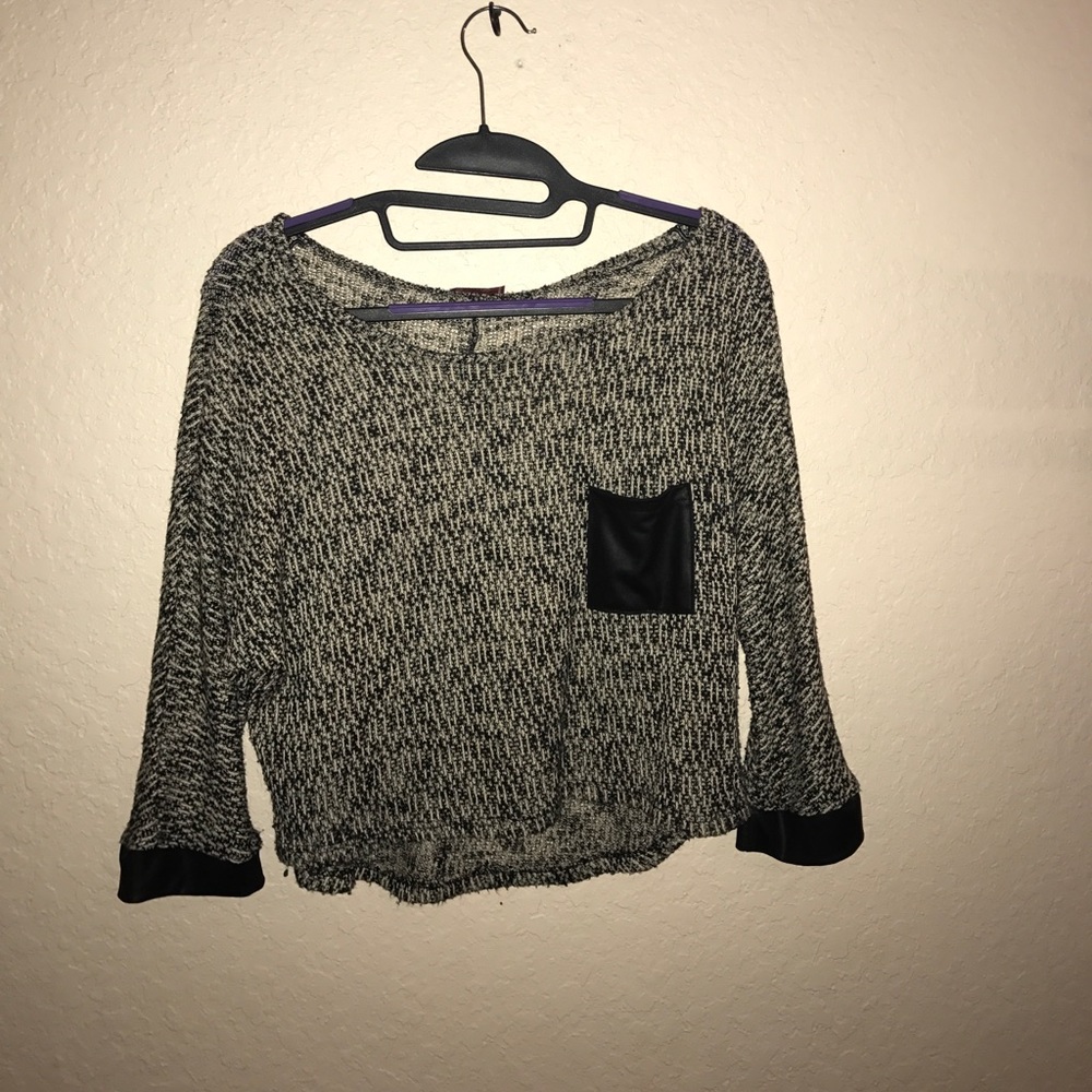 Loose black and white crop top.