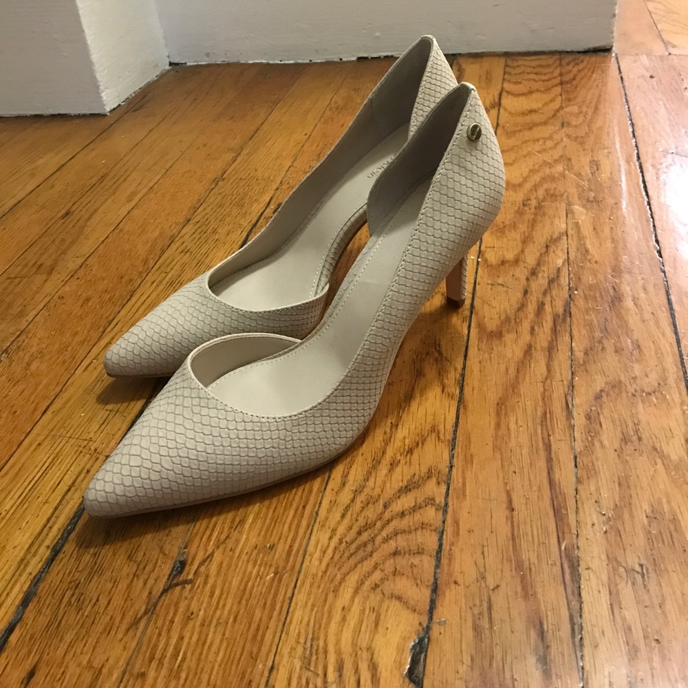 Calvin Klein nude pumps size 9.