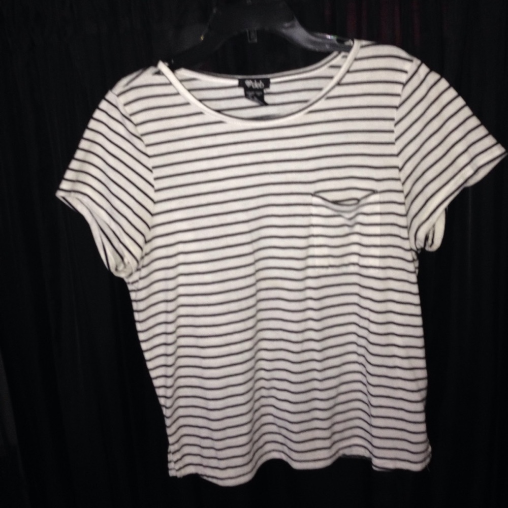 Black/ white striped top, left chest pocket.