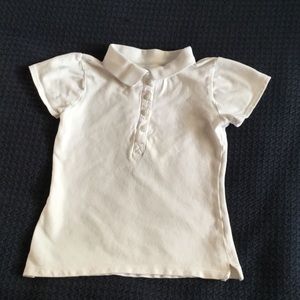 Girl's school uniform short sleeve white polo.