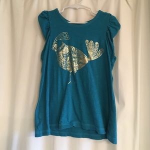 Tea shirt. NWOT. Size 7.