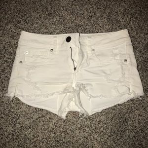 White American Eagle super low shortie jean shorts
