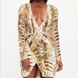 peace + love Gold embellished wrap dress