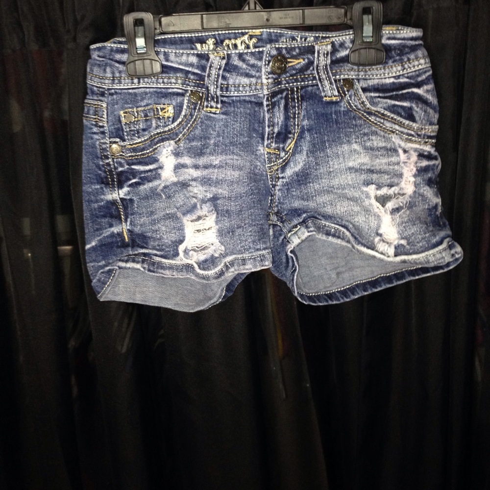 Basic jean shorts with rips.