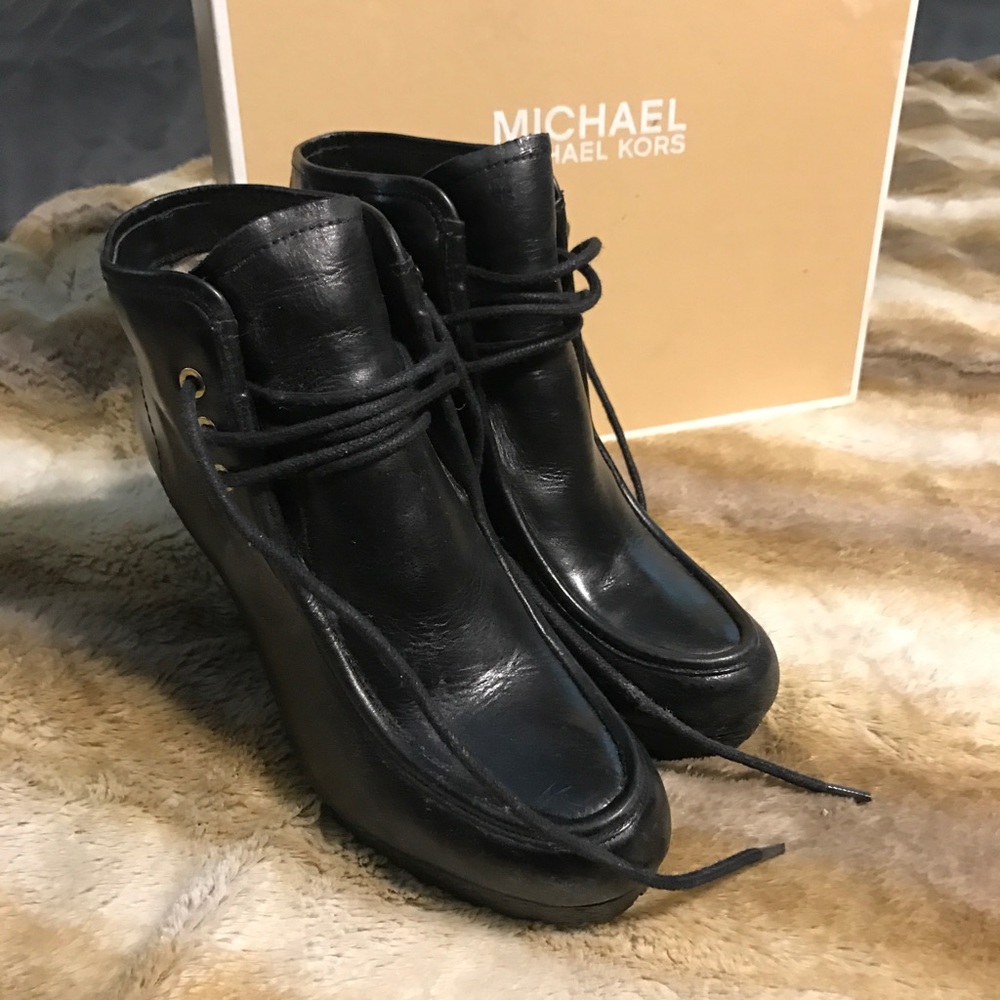 Black Michael kors wedges.