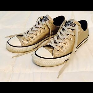 Gold low top converse