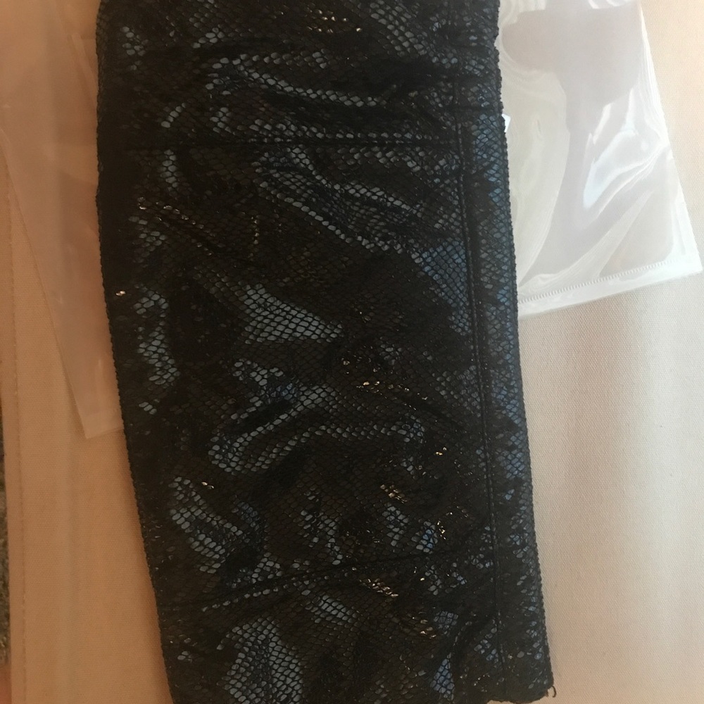 Black faux snake skin clutch