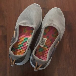 Nike Roshe slip ons.