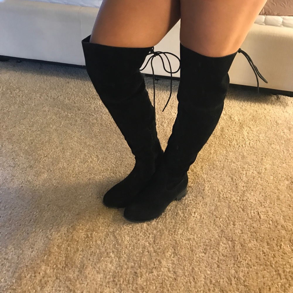 Thigh high black suede boots