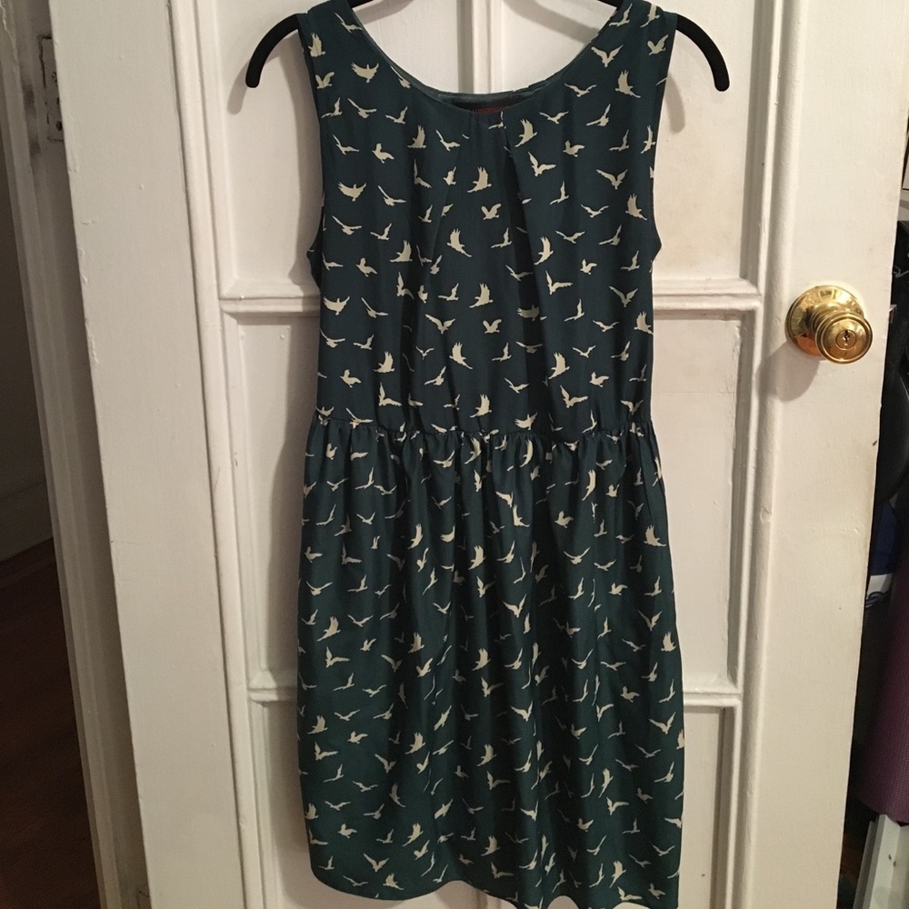 Green bird fit and flare dress