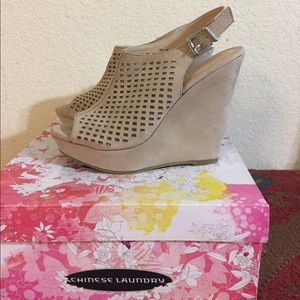 Brand new! Never been used! Tan suede wedges.