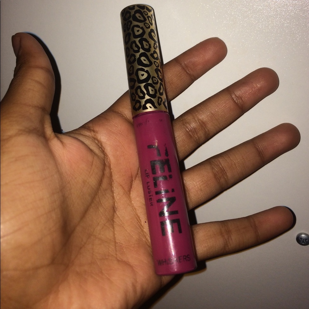 Purple glossy lip luster