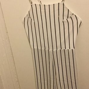 High neck jumpsuit with an open back