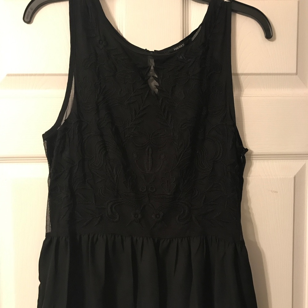 Embroidered Black Peplum Tank