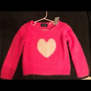 Pink and white sweater