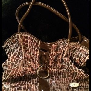 Faux fur and zipper leather bag