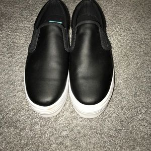 Black platform sneakers