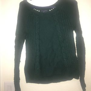 A comfy dark green sweater
