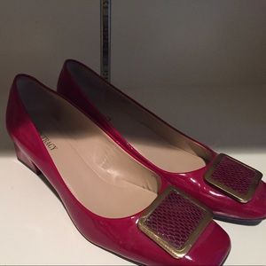 Red patent leather pumps.  Size 8