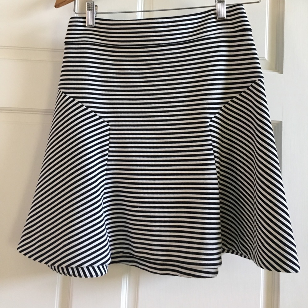 Black and white striped skirt.