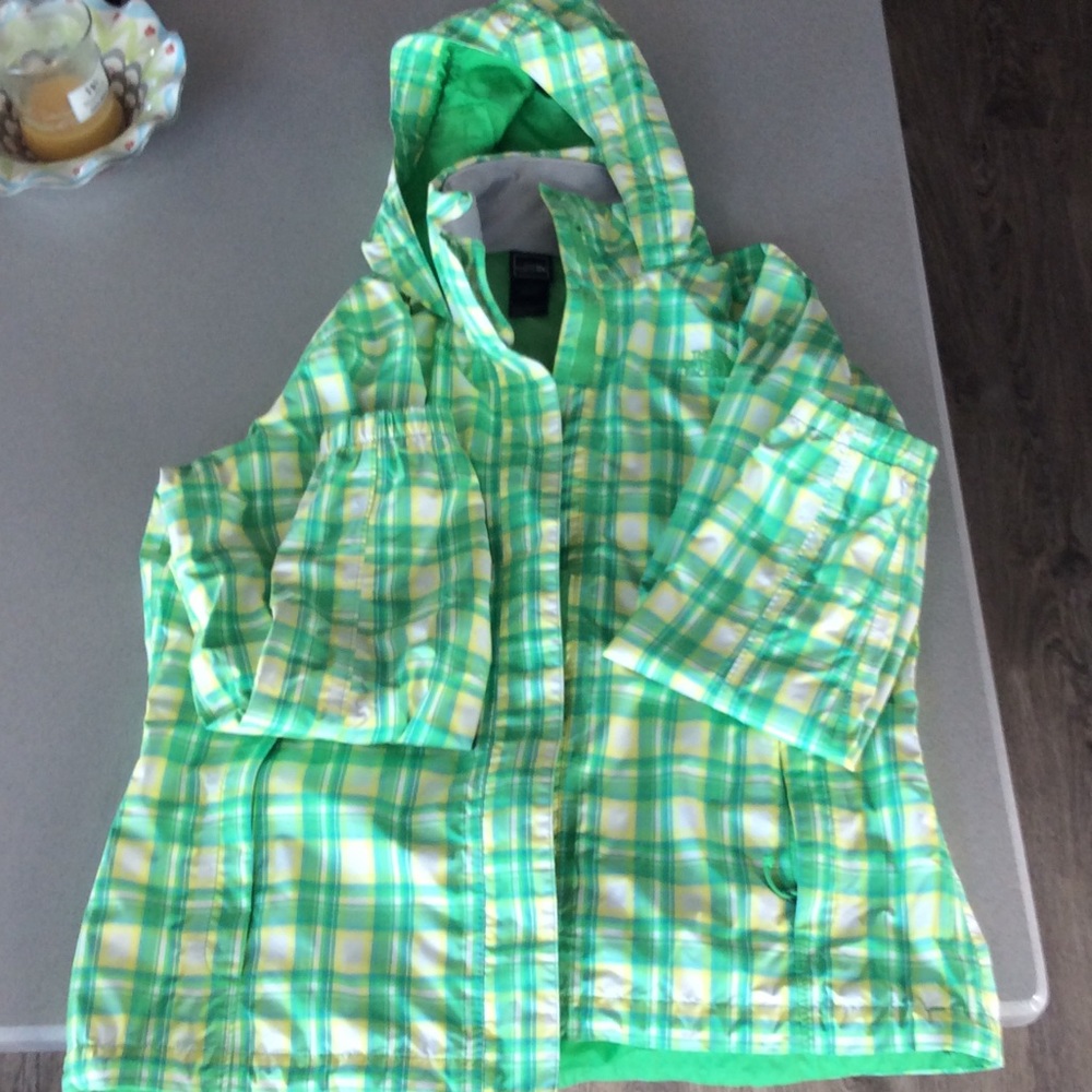 Large green/yellow plaid water resistant shell.