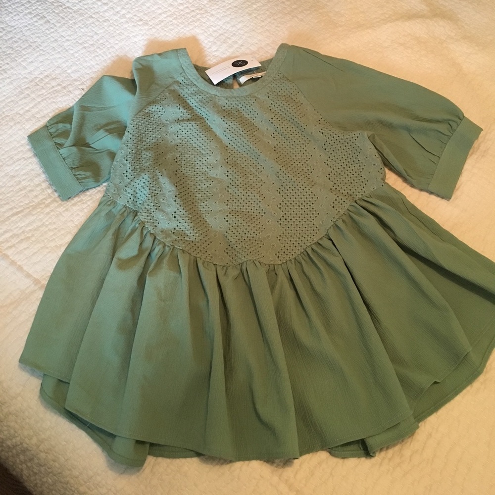 Orange Creek peplum top in sage green