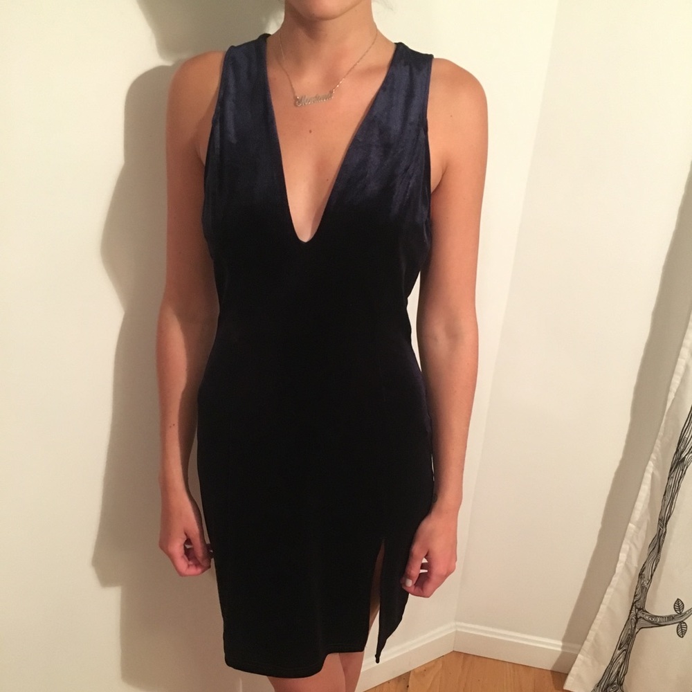 Dark blue velvet v neck dress.