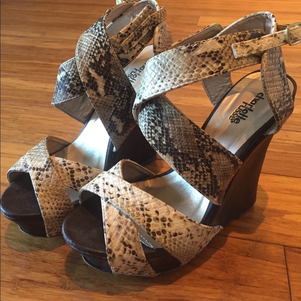 Super cute brown and snakeskin wedges.