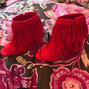 Red suede fringe wedges