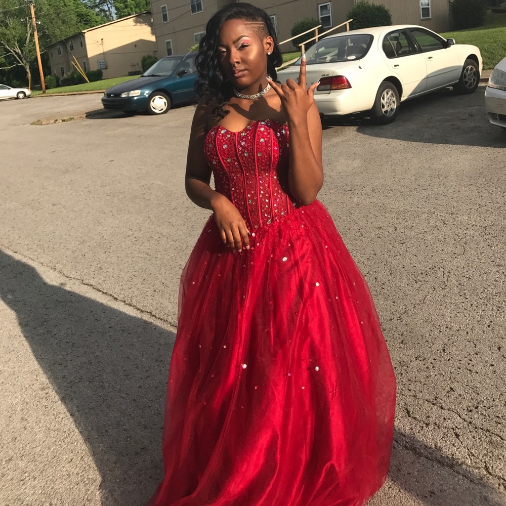 Red corset lace up back ball gown