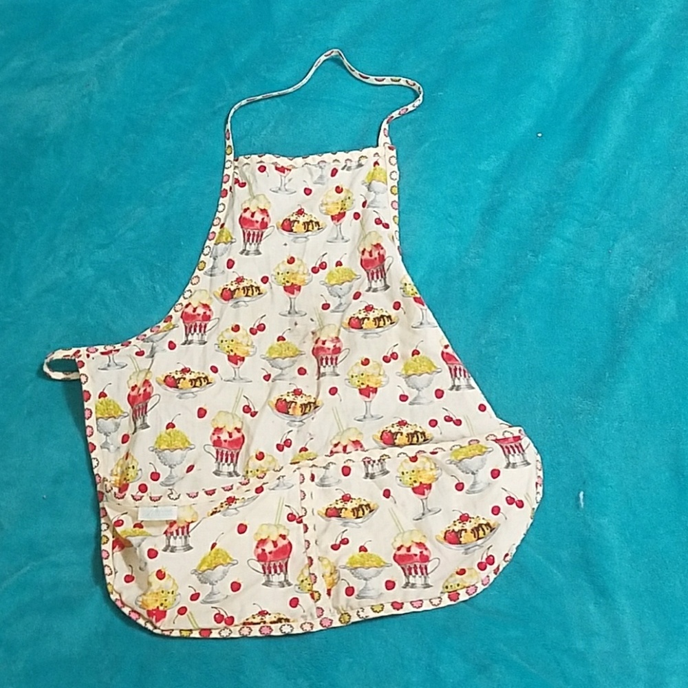 Apron with ice cream sundaes and milkshakes on it