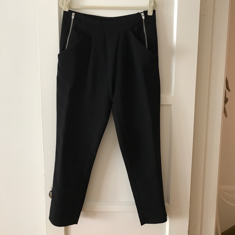 Black pants with silver zippers