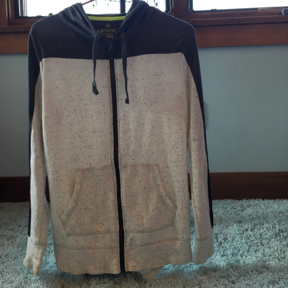 Gray and cream colored jacket