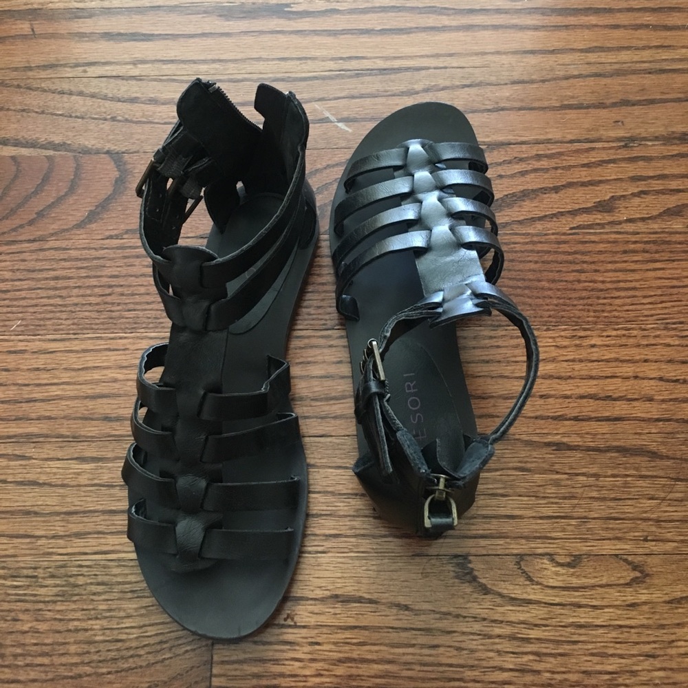 Gently used black leather sandals