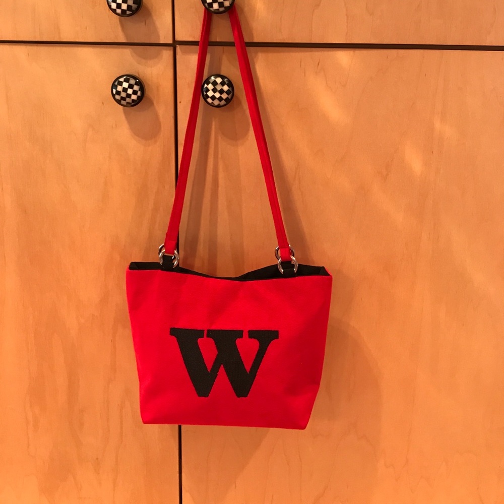 Red bad with black W on the front