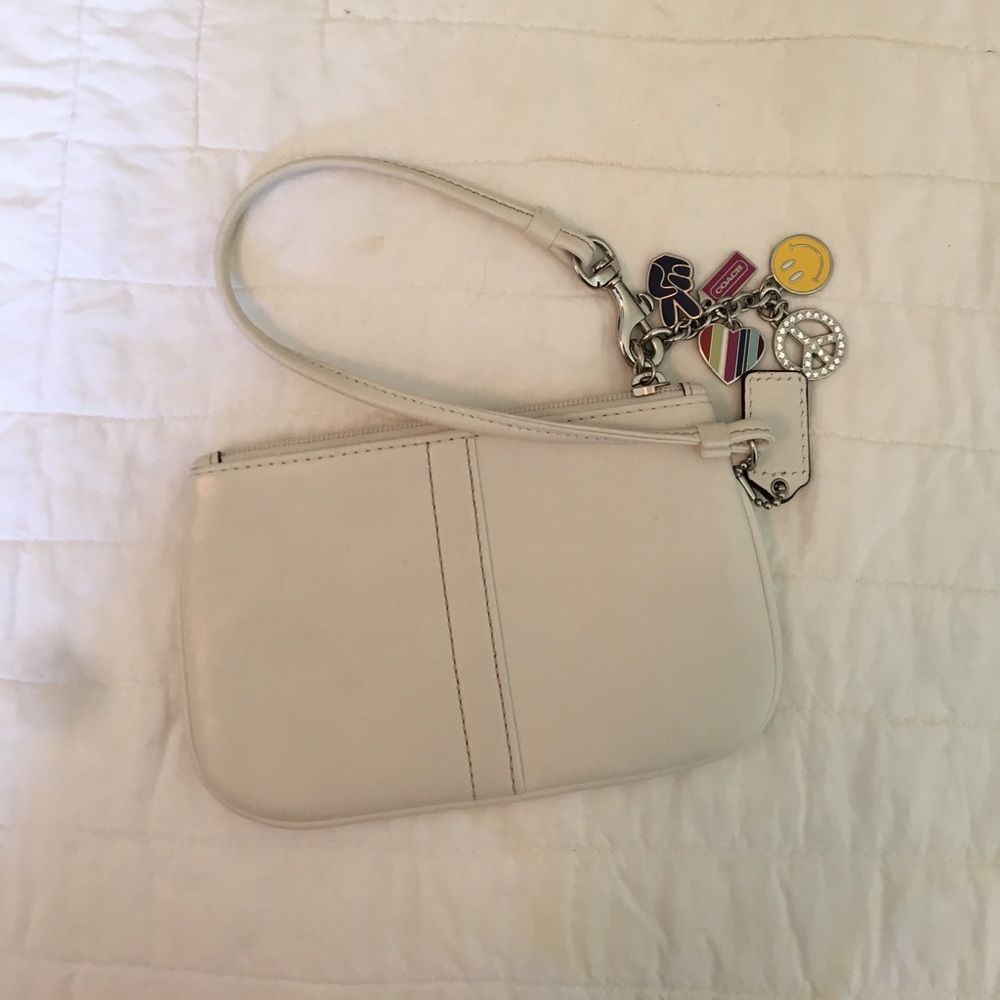 COACH white wristlet with cute hippie charms