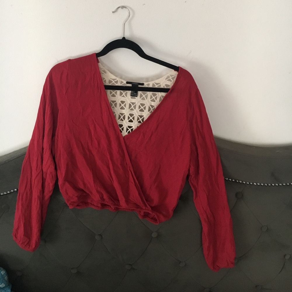 Red crossover top with crochet details