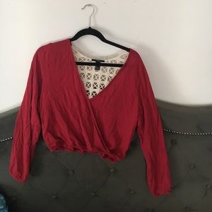 Red crossover top with crochet details