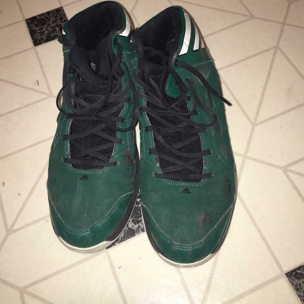 Green adidas basketball shoes