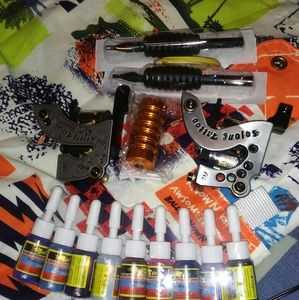 Small tattoo kit. 2 tat guns new & inks.