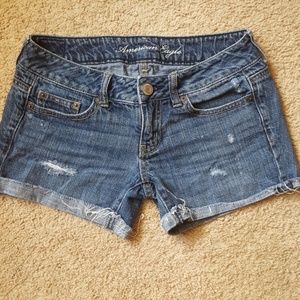 AE Distressed Midi Jean Shorts