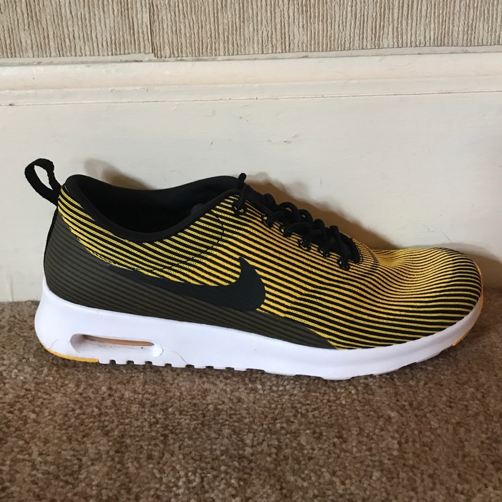 Black and Yellow Nike Running Shoes