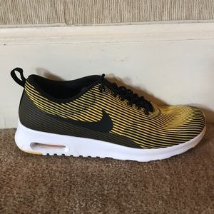 Black and Yellow Nike Running Shoes
