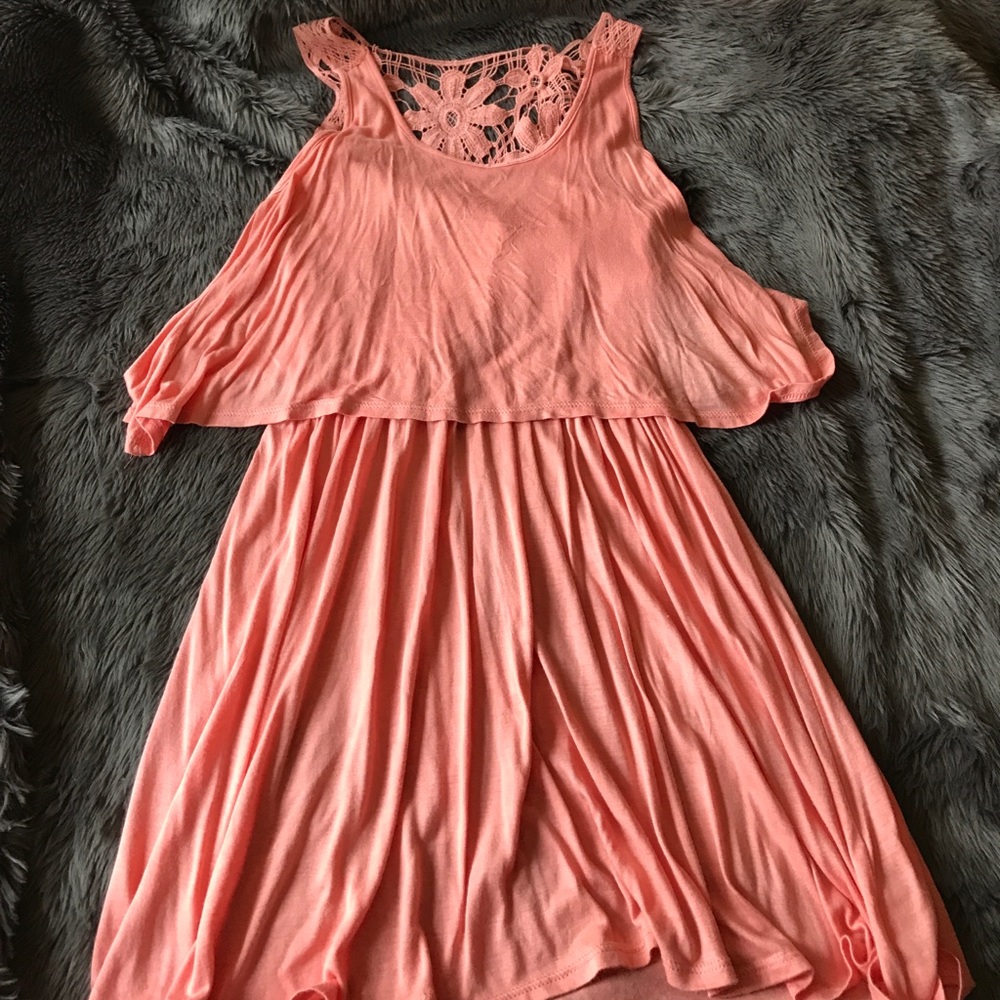 Soft pink dress with mesh back.