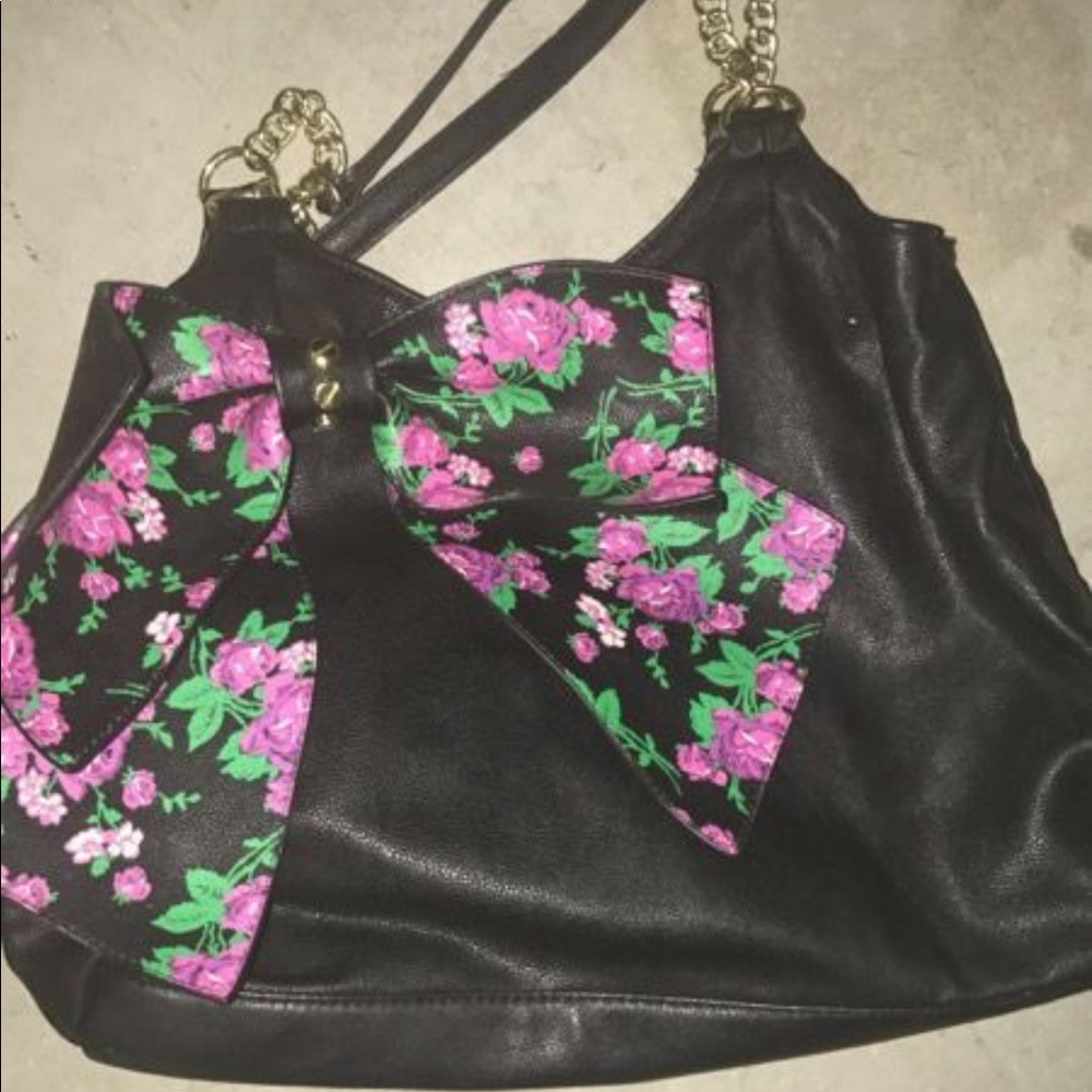 Black ,purple and green purse