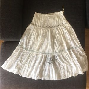 Long white skirt with embroidery