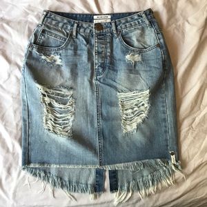 Distressed denim skirt