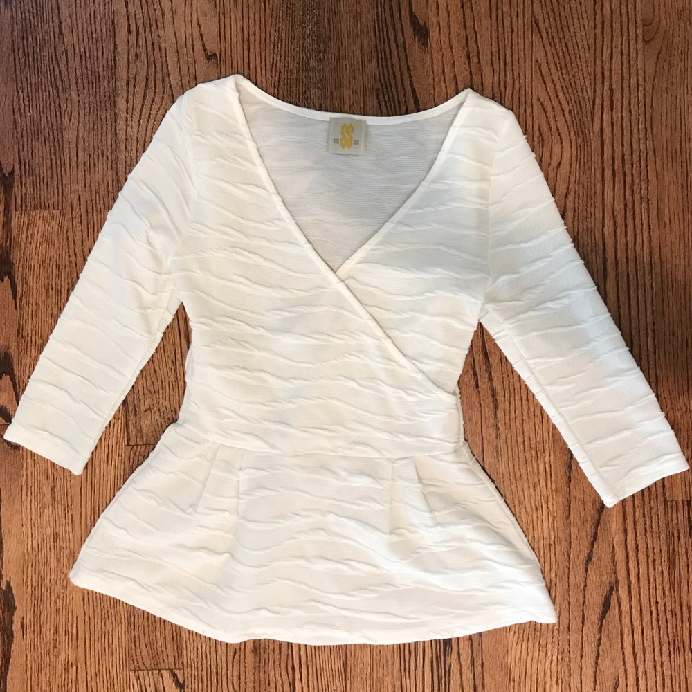 White peplum shirt with quarter length sleeves