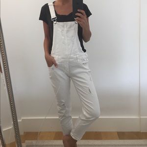 White distressed ankle length overalls